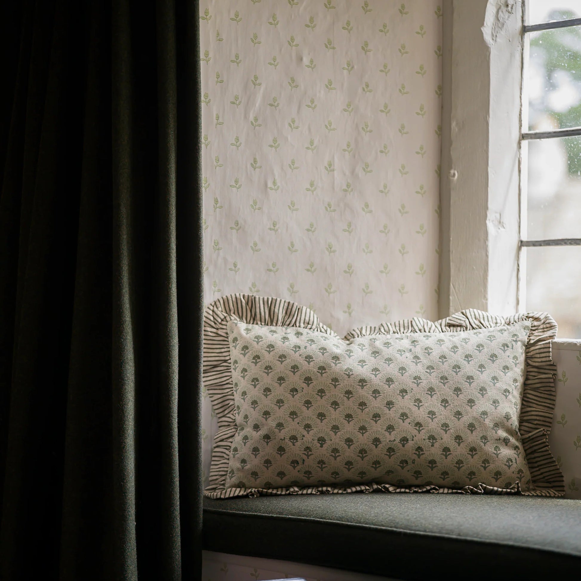 Floral block print cushion with striped trim
Hand block printed floral cushion with feather pad
Artisan floral cushion for sofa styling
Decorative floral cushion with striped border
Traditional block print cushion for layered interiors
Floral patterned cushion styled on an armchair
Luxury feather filled floral cushion
Classic floral cushion with complementary stripe trim